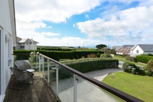 Sea view from the balcony at Little Tremawr in Constantine Bay, Cornwall