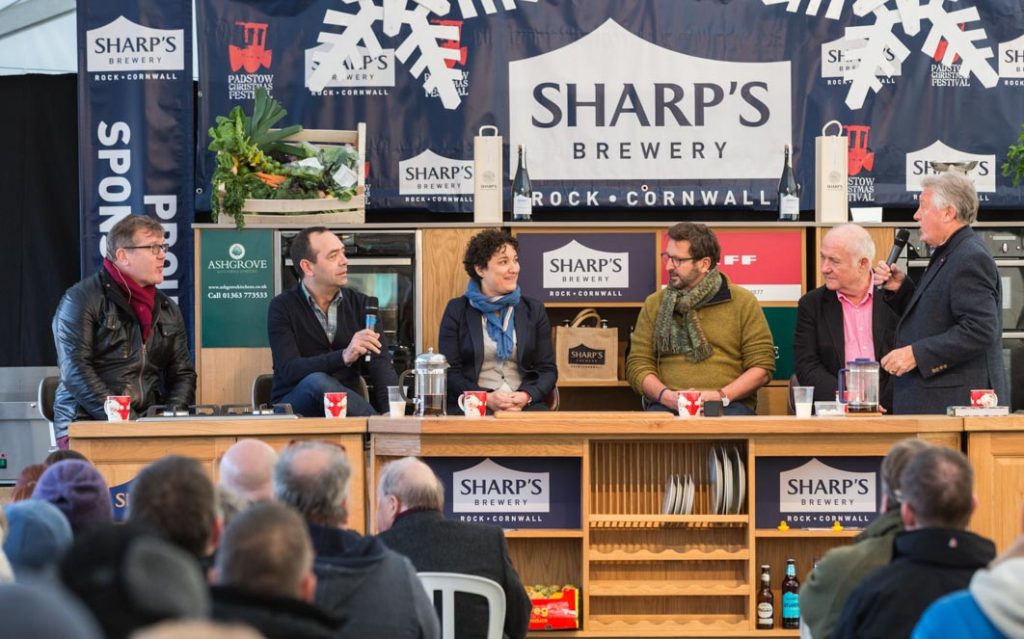 'Ask the Chef' food forum in the Sharp's Chefs Theatre at Padstow Christmas Festival 2016. Chefs from left to right: Nigel Haworth, José Pizarro, Nieves Barragán Mohacho, Mitch Tonks, Rick Stein and Brian Turner.